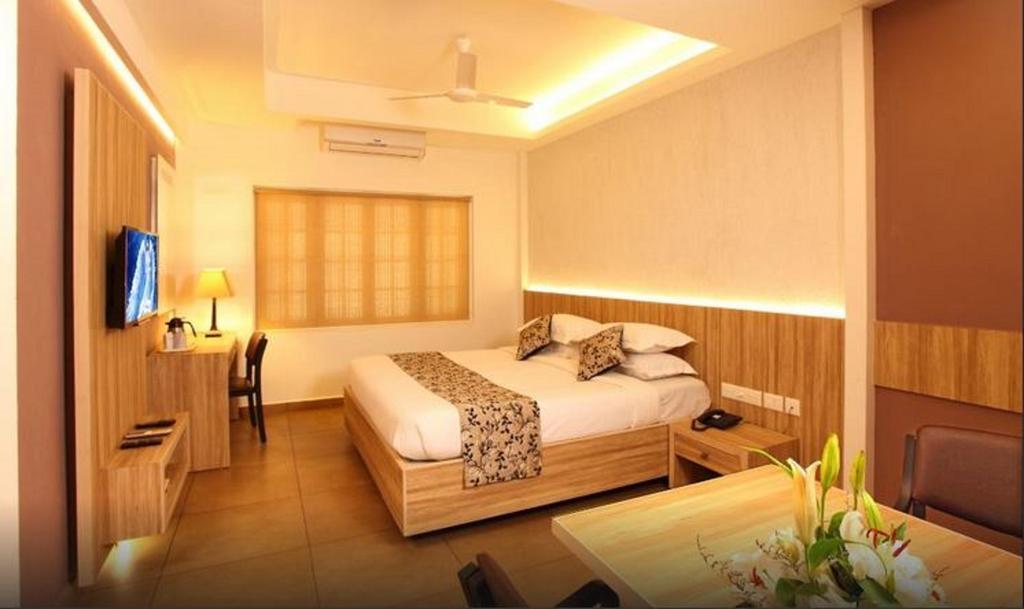 Thrissur Hotel Luciya Palace חדר תמונה